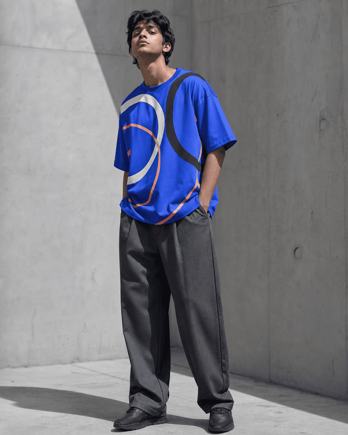 Orbit oversized tee in a concrete setting